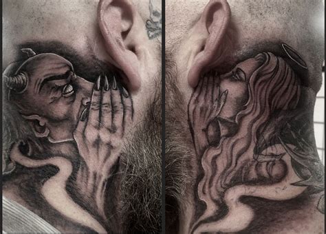 Angel whispering in ear tattoo